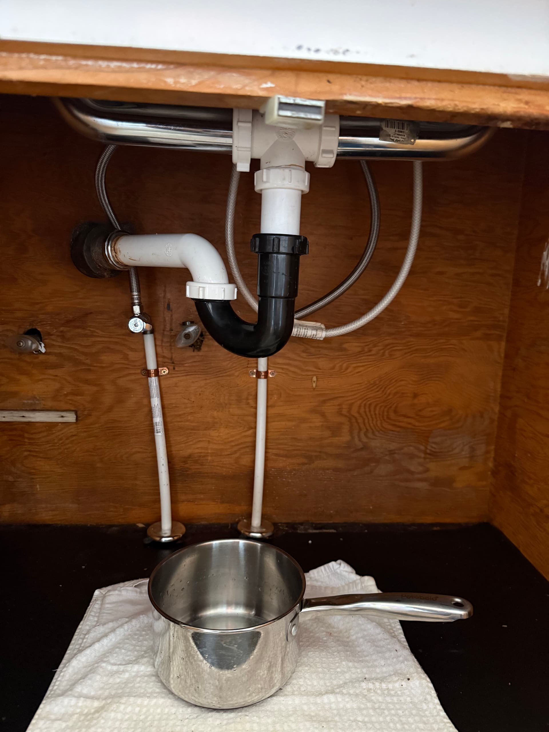 Kitchen Drain Leaking Under the Sink? Here's What Actually Fixes It image